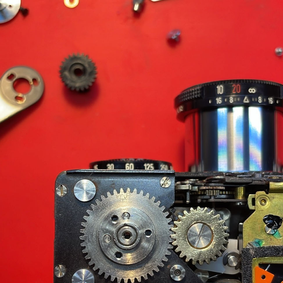 The inside of a Rollei 35 Film camera during repairs by Dan Ho