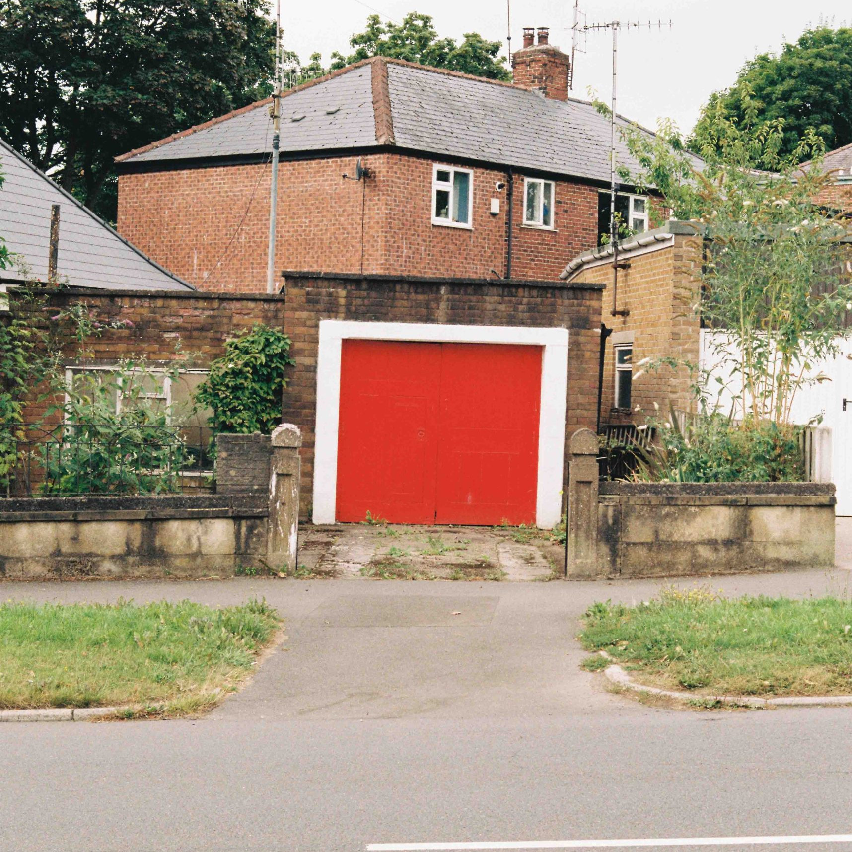 A garage door in sheffield painted red