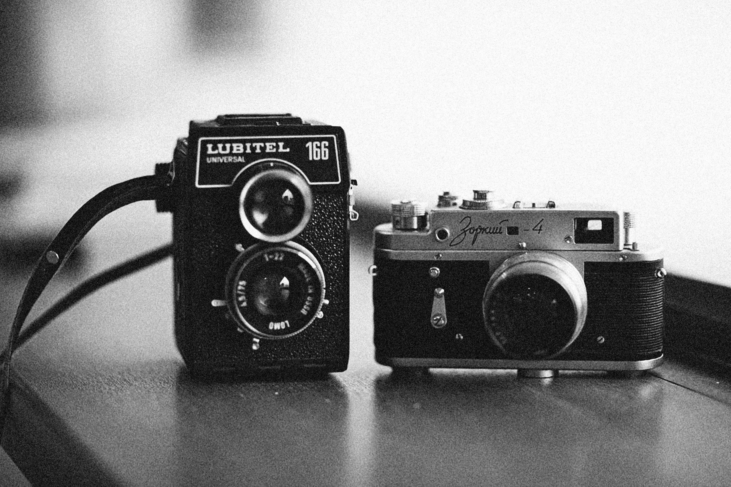 A Lubitel 166 next to a rangefinder film camera